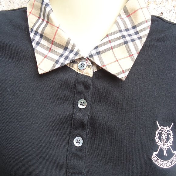 SIZE L. Burberry Golf St. Andrew’s Links shirt with Nova check collar accent. SIZE L. Burberry Golf St. Andrew’s Links shirt with Nova check collar accent.